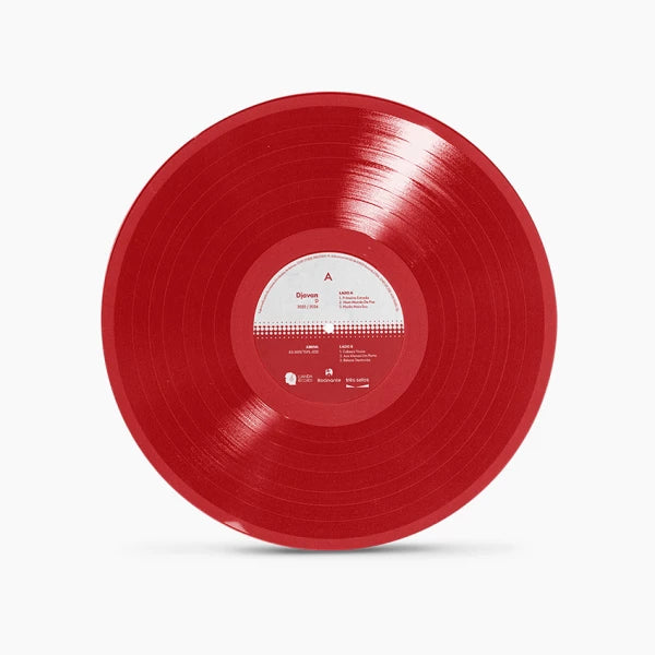 Disco vermelho translúcido da edição em LP do álbum D de Djavan.