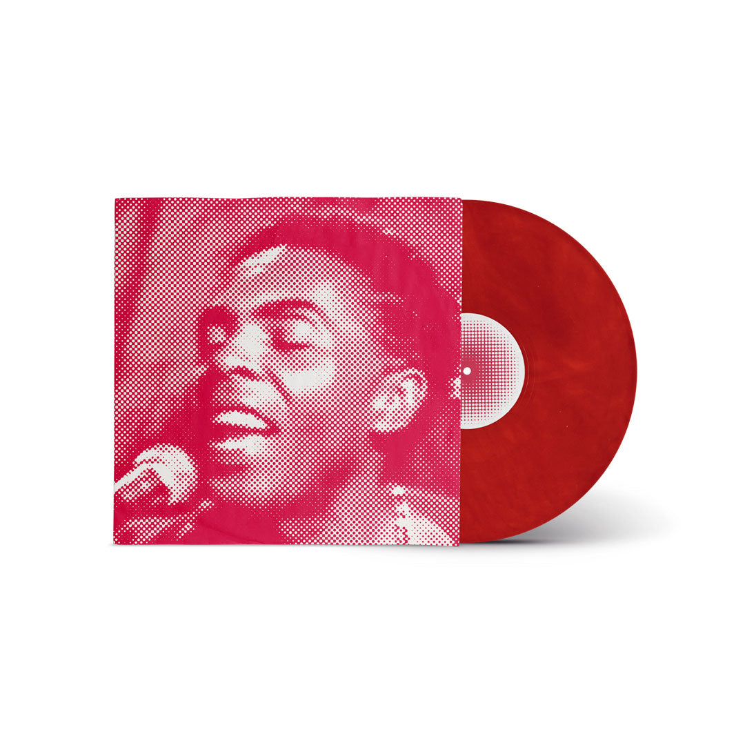 Envelope vermelho do álbum Unplugged de Gilberto Gil, com retrato em retícula do artista cantando ao microfone e disco de vinil vermelho marmorizado saindo pela lateral (disco de vinil).