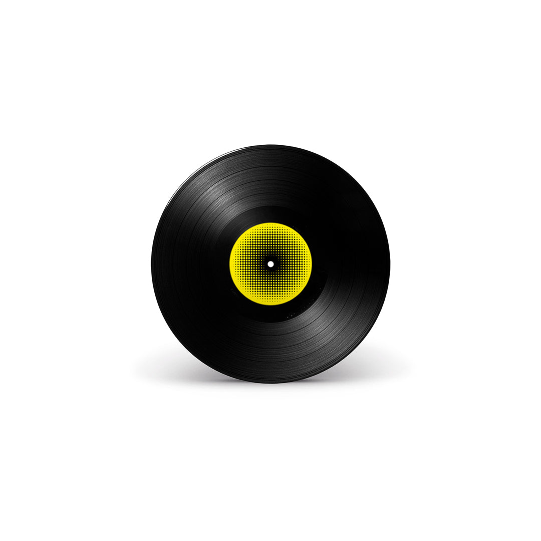 Disco de vinil preto com rótulo central amarelo em padrão pontilhado.